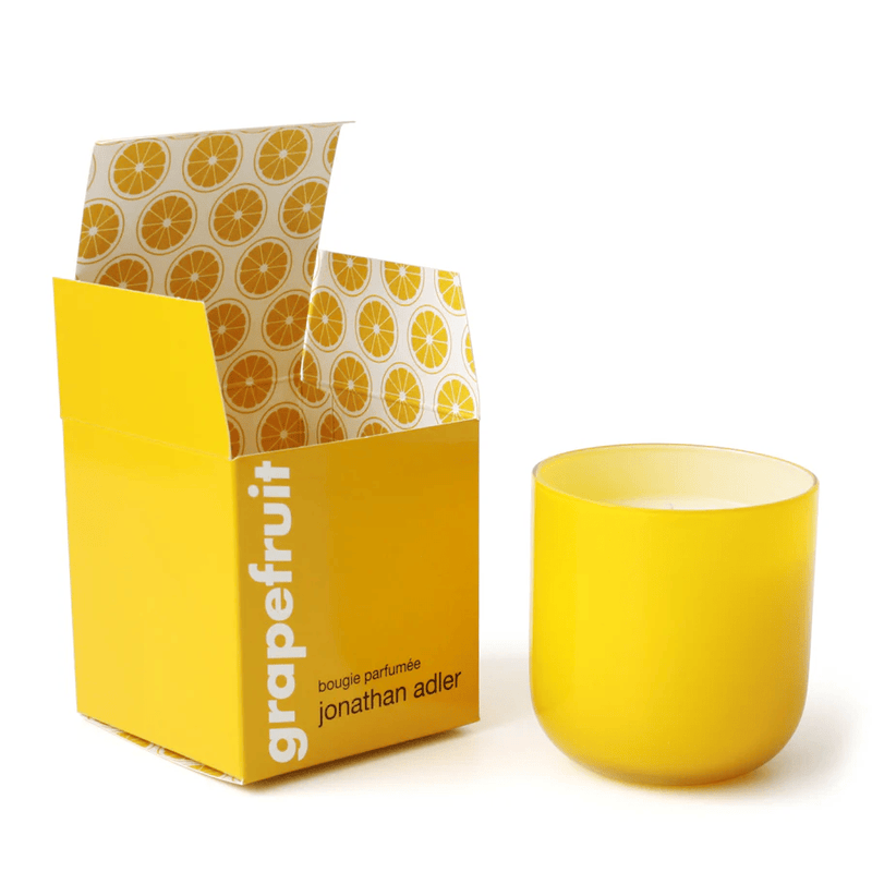 JONATHAN ADLER POP GRAPEFRUIT CANDLE IN YELLOW