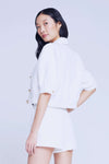 L'AGENCE COVE CROP SHORT SLEEVE JACKET IN WHITE